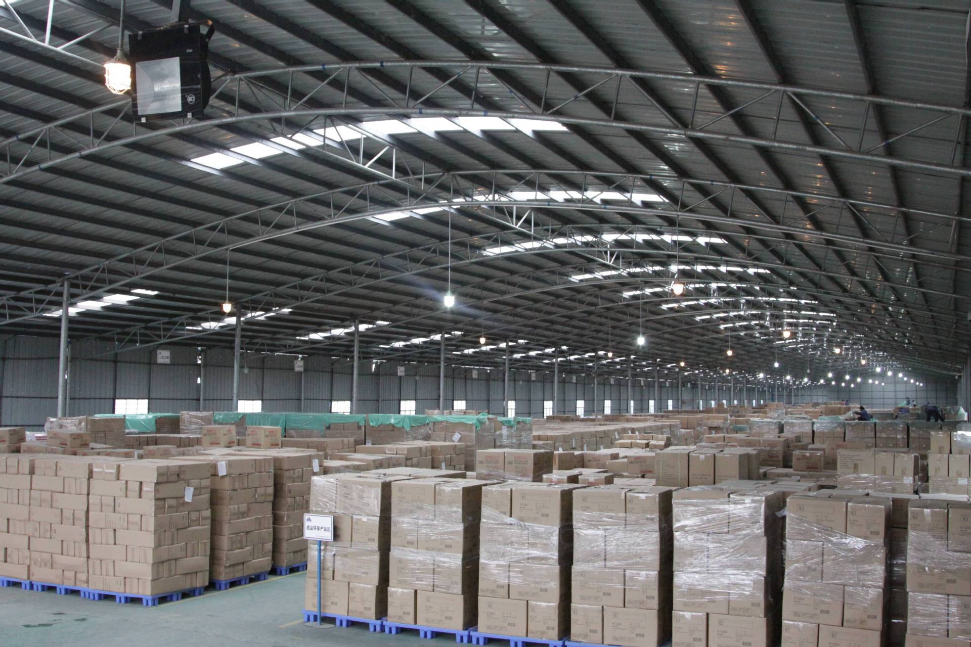 AICO Yoga warehouse filled with packaged cartons ready for shipment for OEM and ODM manufacturing.