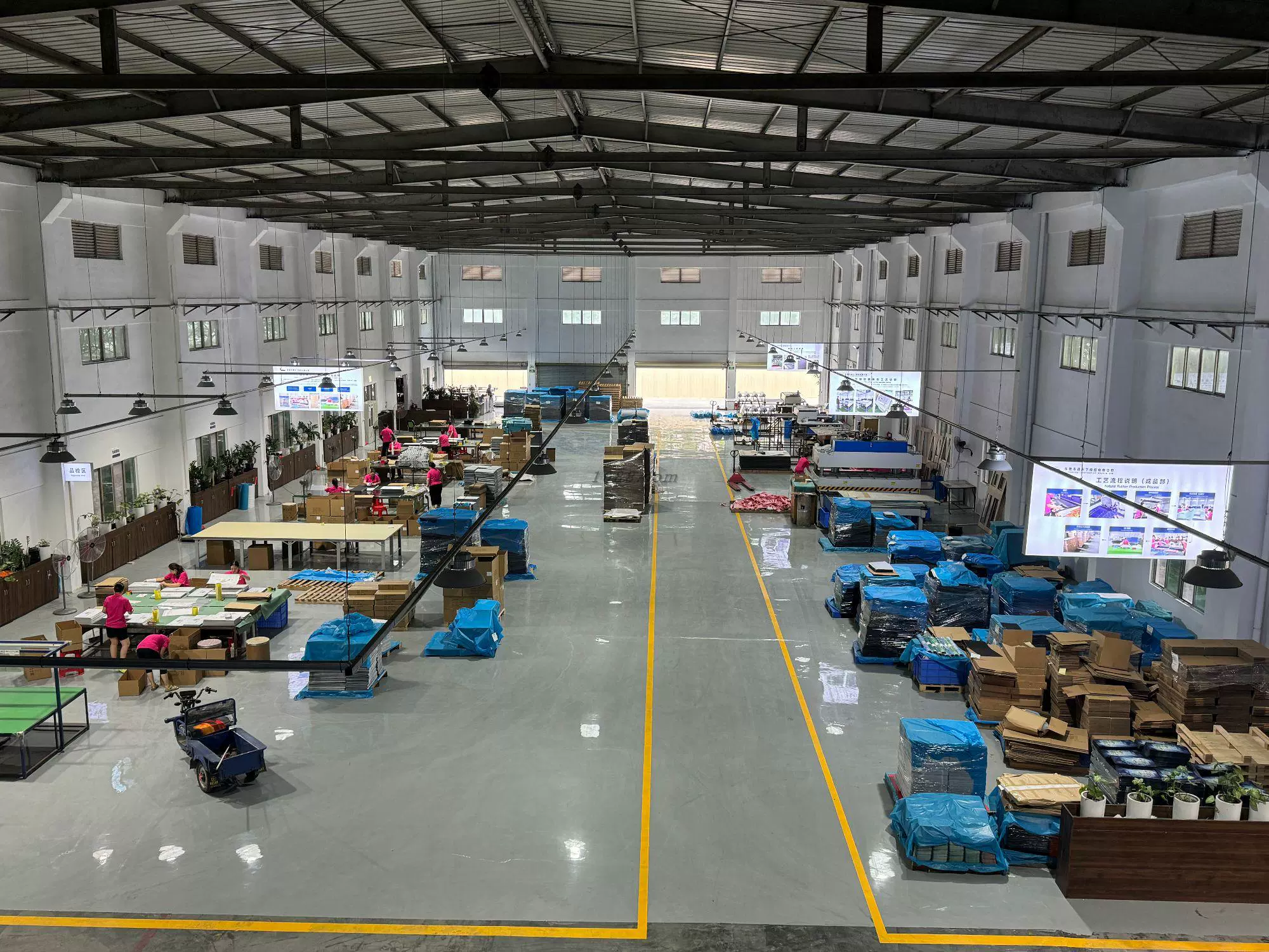 AICO Yoga yoga product manufacturing workshop with production stations for OEM and ODM manufacturing.